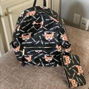 Black Betsey Johnson corgi backpack.